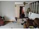 View of the living room area with tiled floors and a decorative ceiling fan at 1152 Ring St, Deltona, FL 32725