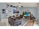 Comfortable living room with tile flooring, ceiling fan and neutral paint colors at 1165 Indian Ridge E Trl, Kissimmee, FL 34747