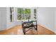 Bright dining area features a window view and an attractive black table and bench at 126 Spanish Moss Ct, Orlando, FL 32828