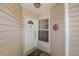 Close-up of a charming front door with decorative elements and a cheerful welcome mat at 126 Spanish Moss Ct, Orlando, FL 32828
