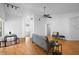 Spacious living room with an open layout, hardwood floors, and modern furnishings at 126 Spanish Moss Ct, Orlando, FL 32828