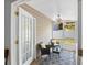 Screened patio with tile flooring, ceiling fan and outdoor seating arrangement at 126 Spanish Moss Ct, Orlando, FL 32828