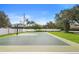 Community basketball court with green and white pavement at 12868 Holdenbury Ln, Windermere, FL 34786