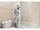 Standard bathroom with shower and tub combo and white tile walls at 12868 Holdenbury Ln, Windermere, FL 34786