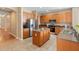 Well-appointed kitchen with stainless steel appliances, granite countertops, and ample cabinet space at 12868 Holdenbury Ln, Windermere, FL 34786
