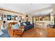 Comfortable living room with adjacent dining area and hardwood flooring at 12868 Holdenbury Ln, Windermere, FL 34786