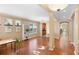 Bright living room with hardwood floors, neutral walls, and an open floor plan at 12868 Holdenbury Ln, Windermere, FL 34786