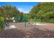 Community playground featuring swings, slide, and climbing structure at 12868 Holdenbury Ln, Windermere, FL 34786
