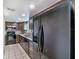 Spacious kitchen with stainless steel appliances and granite countertops at 1301 Winter Green Way, Winter Garden, FL 34787
