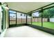 The screened patio overlooks the fenced backyard at 1301 Winter Green Way, Winter Garden, FL 34787