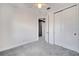 Bedroom with gray carpet, bright walls, ceiling fan and closet with bi-fold doors at 14088 Tarvin St, Orlando, FL 32832