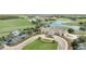 Overhead view of the clubhouse featuring manicured landscaping and ample parking at 14088 Tarvin St, Orlando, FL 32832