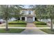 Charming townhome featuring a well-manicured front yard and a lovely tile roof at 14088 Tarvin St, Orlando, FL 32832