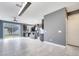 Modern kitchen with gray cabinets, stainless steel appliances, and an island at 14088 Tarvin St, Orlando, FL 32832