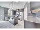 Modern kitchen with granite countertops and dark wood cabinetry at 14088 Tarvin St, Orlando, FL 32832