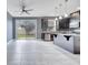 Modern kitchen with a center island and stainless steel appliances at 14088 Tarvin St, Orlando, FL 32832