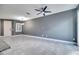 Spacious living room with tile floors and ample natural light at 14088 Tarvin St, Orlando, FL 32832