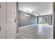 Open-concept living space with sliding glass doors to the backyard at 14088 Tarvin St, Orlando, FL 32832