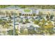 Aerial view of a bustling shopping center with various stores, restaurants, and parking at 14088 Tarvin St, Orlando, FL 32832