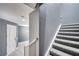 Carpeted staircase leading to the upper level of the home at 14088 Tarvin St, Orlando, FL 32832