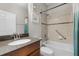 Bathroom features a tiled shower and granite countertop, offering style and convenience at 14242 Desert Haven St # Ge, Windermere, FL 34786