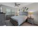 Bright bedroom features neutral walls, carpet, and ceiling fan, creating a relaxing atmosphere at 14242 Desert Haven St # Ge, Windermere, FL 34786