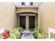 Charming townhouse entrance with inviting walkway and dual front doors at 14242 Desert Haven St # Ge, Windermere, FL 34786