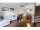 Bright, open living room with hardwood floors that flows into dining area at 14242 Desert Haven St # Ge, Windermere, FL 34786