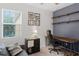 Bright office features stylish shelving and a large window at 14242 Desert Haven St # Ge, Windermere, FL 34786
