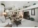 Comfortable living room features neutral tones, vaulted ceilings, and an entertainment center with a fireplace at 1430 Challenger Ave, Davenport, FL 33897