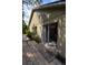 Property with tiled patio and sliding glass doors to the home interior at 1436 Swan Ct, Kissimmee, FL 34759
