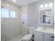 Modern bathroom featuring a tiled shower, updated vanity, and contemporary fixtures at 2005 Dalton Ave, Deltona, FL 32725