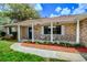 Inviting front porch with decorative accents and charming curb appeal at 2005 Dalton Ave, Deltona, FL 32725