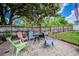 Outdoor patio seating area featuring colorful chairs, perfect for backyard entertaining at 2005 Dalton Ave, Deltona, FL 32725