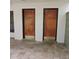Community bathrooms on a stone floor, offering convenience and accessibility for residents at 2480 Tahoe Cir # 2480, Winter Park, FL 32792