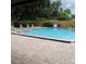 Outdoor pool with lounge seating, perfect for relaxing and enjoying sunny days in this community at 2480 Tahoe Cir # 2480, Winter Park, FL 32792