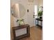 Bright entryway with wood floors, decorative accents, and a welcoming ambiance at 2480 Tahoe Cir # 2480, Winter Park, FL 32792