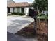 Charming single-story home featuring a well-maintained lawn and a two-car driveway at 2480 Tahoe Cir # 2480, Winter Park, FL 32792