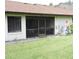 Exterior back of home featuring a screened in porch at 2480 Tahoe Cir # 2480, Winter Park, FL 32792