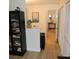 Hallway with wood-style floors and view of the interior decor at 2480 Tahoe Cir # 2480, Winter Park, FL 32792