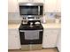 Well-equipped kitchen featuring stainless steel appliances and ample counter space at 2480 Tahoe Cir # 2480, Winter Park, FL 32792