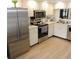 Bright kitchen with stainless steel appliances, light wood floors and lots of cabinet space at 2480 Tahoe Cir # 2480, Winter Park, FL 32792