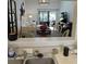 Open concept living room and dining area showcasing the flow to the outdoor space at 2480 Tahoe Cir # 2480, Winter Park, FL 32792