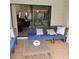 Covered patio with comfortable seating and a view of the landscaped backyard at 2480 Tahoe Cir # 2480, Winter Park, FL 32792