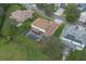 Aerial view of property shows home is surrounded by mature trees and lush landscaping at 2507 Water Valley Dr, St Cloud, FL 34771