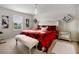 This bedroom is decorated with coordinated decor and a statement overhead light fixture at 2507 Water Valley Dr, St Cloud, FL 34771