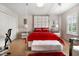 Stylized bedroom boasts sleek modern furniture, statement headboard, and ample natural light at 2507 Water Valley Dr, St Cloud, FL 34771