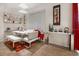 Modern dining area features a chic chandelier, buffet and bright white decor at 2507 Water Valley Dr, St Cloud, FL 34771