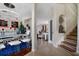 Contemporary dining area with stylish chandelier, modern decor, and staircase at 2507 Water Valley Dr, St Cloud, FL 34771