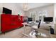 Contemporary home office with modern desk setup, ample storage, and a large overhead light fixture at 2507 Water Valley Dr, St Cloud, FL 34771